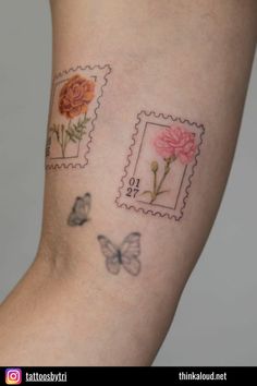 two stamps with flowers and butterflies on each side of the arm, one has a butterfly