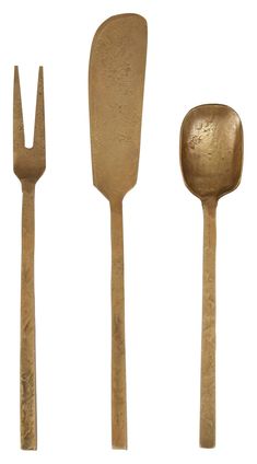 three different types of gold colored utensils and spoons on a white background