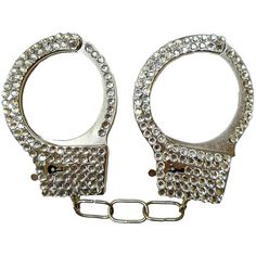 Add some sparkle to your cop or criminal costume with Silver Rhinestone Handcuffs. These eye-catching handcuffs are covered in rhinestones making them a perfect accessory for themed parties. Made of plastic they are lightweight and easy to handle. pbSilver Rhinestone Handcuffs product details:-b-p ul liPlastic-li liSpot clean only-li -ul Grace Core, Police Costume, Silver Rhinestone, Costume Accessories, Belt Buckles, Mansion, Halloween Shopping, Halloween Costumes, Sparkle