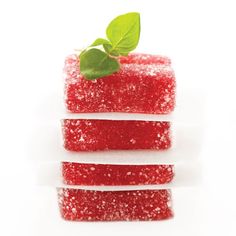 three pieces of red cake with green leaf on top