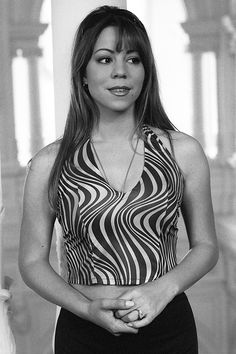 black and white photograph of a woman posing for the camera