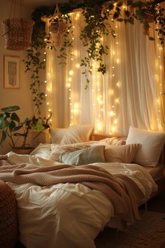 an unmade bed with lights hanging from the ceiling