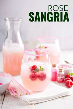 two glasses filled with raspberry rose sangria