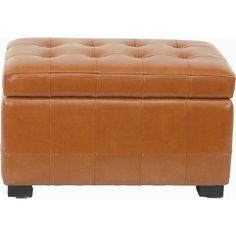 a tan leather ottoman with black legs