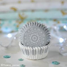 a cupcake tin sitting on top of a table