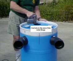 a man standing next to a blue and white fire hydrant with words on it