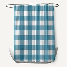 a blue and white checkered shower curtain hanging from a metal hook on a wall