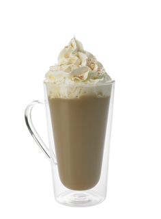 a glass cup filled with whipped cream and coffee