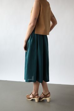 - Handmade in our studio from 100% linen - Full pleated skirt  - Buttons opening at the front side - Side pockets - Length off the skirt from the waist to the hem - 74 cm/29 in Spring Linen Culottes With Pockets, Spring Pleated Linen Bottoms, Spring Linen Pleated Bottoms, Chic Linen Midi-length Bottoms, Summer Linen Midi-length Bottoms, Flowy Linen Pleated Skirt, Linen Pleated Long Skirt, Linen Pleated Skirt For Work, Casual Linen Pleated Skirt