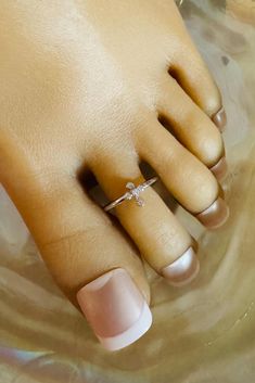 This silver toe ring features a cross with 5 inlaid crystals that adorn the toe. This toe ring is size adjustable and one size fits most. Comfortable and versatile, it will lend itself to casual or formal events. All items are made in a smoke free environment. *If there is any issue with your order, please let me know so I can correct it. Thanks for visiting my shop!👣 Columbia Tn, Ring Crystal, Silver Toe Rings, Crystal Cross, Toe Ring, Silver Cross, Toe Rings, Ring Silver, Body Jewelry