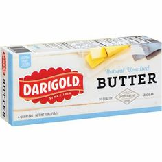 a carton of butter sitting on top of a white table