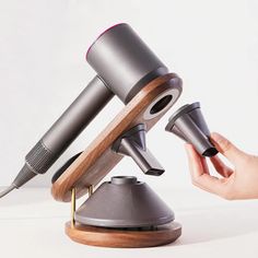 PRICES MAY VARY. 【Unique Design for Dyson】It can be used as the holder of hair dryer, diffuser and nozzle, which can firmly support your Dyson hair dryer in 45 degree support mode. This magnetic hair dryer bracket can be compatible with all dyson supersonic models, it can accommodate all hair dryer nozzle accessories. (Dyson hair dryer and all accessories are not included.) 【High Quality】This hair dryer stand holder uses solid wood as raw material, and its surface is treated with open spray pain Blow Dryer Storage, Blow Dryer Holder, Supersonic Hair Dryer, Lazy Hair, Hair Dryer Stand, Hair Dryer Accessories, Hair Dryer Storage, Dyson Hair, Bathroom Stand