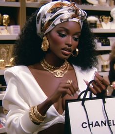 a woman is holding a shopping bag and looking at it in a store with other mannequins on the shelves behind her