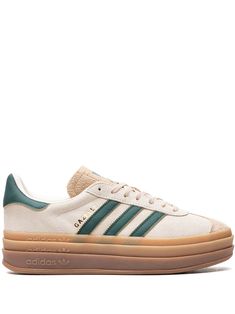 cream white dark green suede signature 3-Stripes logo contrasting heel counter round toe front lace-up fastening logo-print tongue branded insole gum-rubber sole flatform sole These styles are supplied by a premium sneaker marketplace. Stocking only the most sought-after footwear, they source and curate some of the most hard to find sneakers from around the world. Adidas Gazelle Bold, Kickin It, Gazelle Bold, Nice Clothes, Adidas Originals Women, Cute Sneakers, Green Sneakers, Sneakers Adidas, Swag Shoes