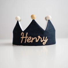 a crown with the word henry written on it