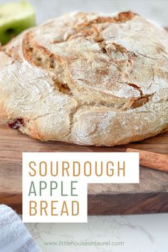 sourdough apple bread on a cutting board with the words sourdough apple bread