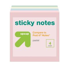 sticky notes with green arrow on pink background