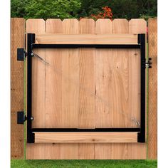 a wooden fence with black metal bars on it