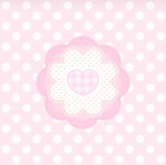 a pink polka dot wallpaper with a heart in the center