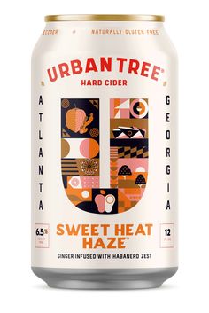 a can of urban tree sweet heat haze beer on a white background with an orange and pink design