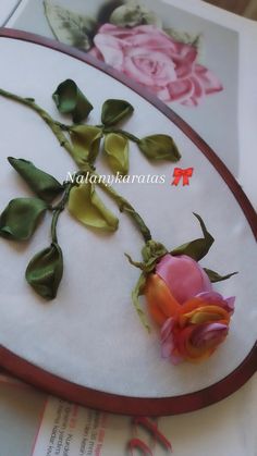 a close up of a flower on a table