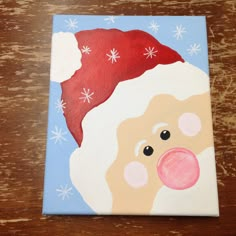 a painting of a santa claus with snowflakes on it's head and nose