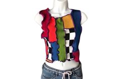 One of a kind color block pop art sweater top, size Small. ❤️DESCRIPTION:  One of a kind, 80% recycled patchwork knit top. Brlliant color block top in a color palette of lime green, orange, yellow, blue, pink, purple, and black & white. Both the front and the back have the same motif. Midriff-baring cropped length. Versatile and so easy to wear. Pair it with distressed jeans, joggers, a skirt - whatever motivates you, for a one of a kind look. And feel good about choosing slow fashion with recyc Retro Knit Color Block Tops, Retro Color Block Knit Tops, Casual Patchwork Sleeveless Sweater Vest, Playful Cotton Patchwork Tops, Playful Patchwork Cotton Tops, Colorful Patchwork Top For Fall, Multicolor Knit Sweater Vest With Crew Neck, Multicolor Knit Crew Neck Sweater Vest, Casual Multicolor Cotton Sweater Vest