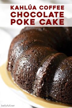 a chocolate cake on a plate with the words kahlua coffee chocolate poke cake