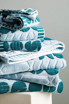 several folded towels stacked on top of each other