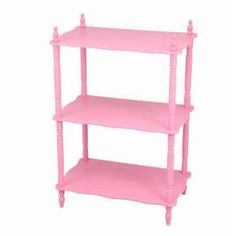 three tiered shelf with pink paint on the top and bottom shelves, in front of a white background