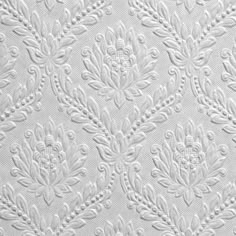 an intricate white wallpaper pattern