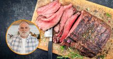 a man standing in front of a cutting board with steak on it and a photo of him