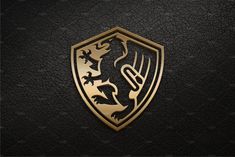 the logo for ferrari is shown on a black leather background with gold foil and an intricate lion