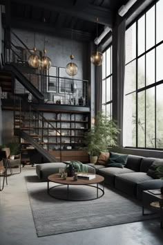 an industrial living room with large windows and lots of natural light coming through the windows