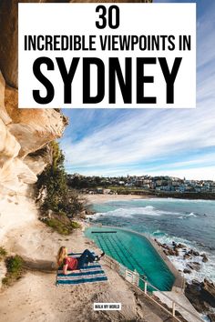 a woman laying on top of a beach next to the ocean with text overlay that reads 30 incredible viewpoints in sydney