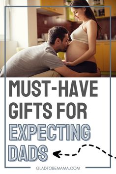 a pregnant man and woman cuddling on the bed with text overlay that reads must have gifts for expecting dads