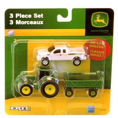 a green and white toy truck with yellow wheels