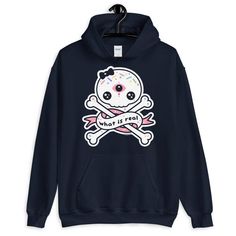 A pastel goth hoodie with kawaii skull.This hooded sweatshirt looks great on both men and women.Perfect for people who love looking cute and questioning the true nature of reality.Runs large for women.Fits men true to size.Lined hoodDouble stitched throughoutSoftHas a pocketRuns large for womenReduced pillingPlus sizes available up to 5XOriginal artwork not available in storesSizing tip: Take a shirt that fits you the way you like, lay it flat and measure the width (from under one arm to under t Kawaii Streetwear Hoodie With Letter Print, Casual Hooded Sweatshirt With Skull Print, Kawaii Graphic Print Hoodie For Fall, Fall Kawaii Hoodie With Graphic Print, Fun Cotton Hooded Hoodie, Fun Cotton Hoodie, Casual Skull Print Hoodie, Fun Hooded Sweatshirt For Streetwear, Cute Cotton Hoodie For Streetwear