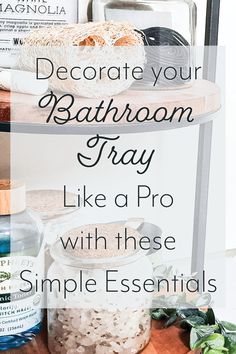 a bathroom shelf with soaps, scrubs and other items on it text reads decorate your bathroom tray like a pro with these simple essentials