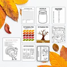 the thanksgiving printables are on display with leaves and other things to make it look like