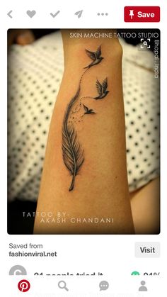 a woman's arm with three birds flying in the air and a feather tattoo on it