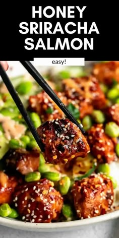 honey sriraca salmon with chopsticks in a bowl