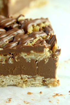 there is a piece of cake with chocolate and nuts on it