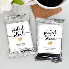 two bags of coffee sitting on top of a table