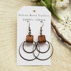 These bronze and leather hoop earrings are simply beautiful. The double hoop design is finished with a hand-patterned medium brown leather strip. They are lightweight and very easy to wear. -Vegetable tanned leather -Eco-friendly leather dye -Nickel free antique bronze brass hardware. -Rubber back (be sure to wear backs with these earrings) **Do not wear in water.** This listing is for one pair of bronze metal and leather hoop earrings. Everyday Brown Metal Jewelry, Brown Hoop Earrings With Ear Wire For Gift, Brown Hoop Earrings For Gift, Minimalist Brown Hoop Earrings For Gift, Brown Copper Hoop Earrings As Gift, Copper Brown Hoop Earrings As A Gift, Everyday Brown Metal Earrings, Brown Small Hoop Earrings As Gift, Brown Small Hoop Earrings For Everyday