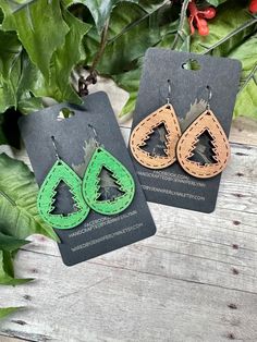 "These tear drop earrings are laser cut and engraved. A festive little tree is cut out of the center, with faux stitching around the tree and outside edge.  1.5\" inch long teardrop Very lightweight  Stainless steel ear wires.  *check out my shop for more earrings and other handmade gifts* Wiredbyjenniferlynn.Etsy.Com  --home decor--earrings--keychains--ornaments--gifts-- *visit me on Facebook! Message me for discounts, like my page to stay in touch and see new items!* facebook.com/HandcraftedBy Wooden Laser Cut Ideas, Glowforge Gift Ideas, Laser Engraving Ideas, Christian Boutique, Cricut Jewelry, Cricut Earrings, Glowforge Projects, Diy Leather Earrings, Laser Cut Wood Earrings