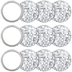 silver disco balls and mirrors on a white background