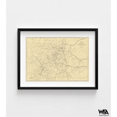 a framed map hanging on the wall