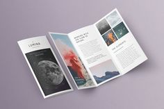 an open brochure with images of mountains and the moon in it on a purple background