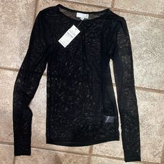 Long Sleeve Meesh Top Brand New Never Worn Chic Fishnet Mesh Top, Black Nylon Mesh Top With Sheer Sleeves, Black Mesh Top With Sheer Sleeves In Nylon, Black Fishnet Top For Fall, Stretch Open Knit Mesh Top, Stretch Mesh Top With Open Knit, Black Nylon Mesh Top With Long Sleeves, Black Nylon Long Sleeve Mesh Top, Black Mesh Top With Mesh Sleeves For Spring